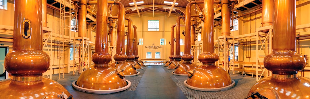 Copper distillery still and flame